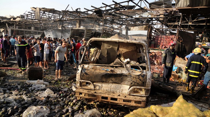 Irak : 12 morts dans deux attentats à Bagdad - ảnh 1